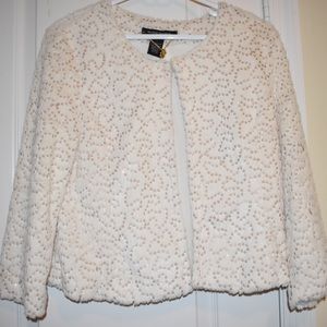 Faux Fur Jacket with champagne sequins.